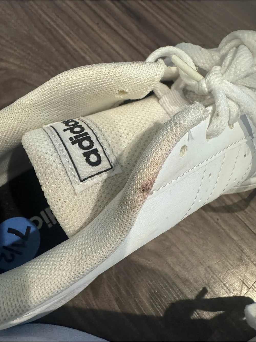 Adidas Women’s White Sneakers with Black Stripes